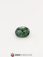 Load image into Gallery viewer, Glistening Oval Teal Sapphire 1.78ct
