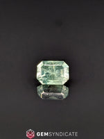 Load image into Gallery viewer, Flirty Emerald Cut Teal Sapphire 1.95ct
