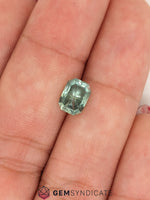 Load image into Gallery viewer, Flirty Emerald Cut Teal Sapphire 1.95ct
