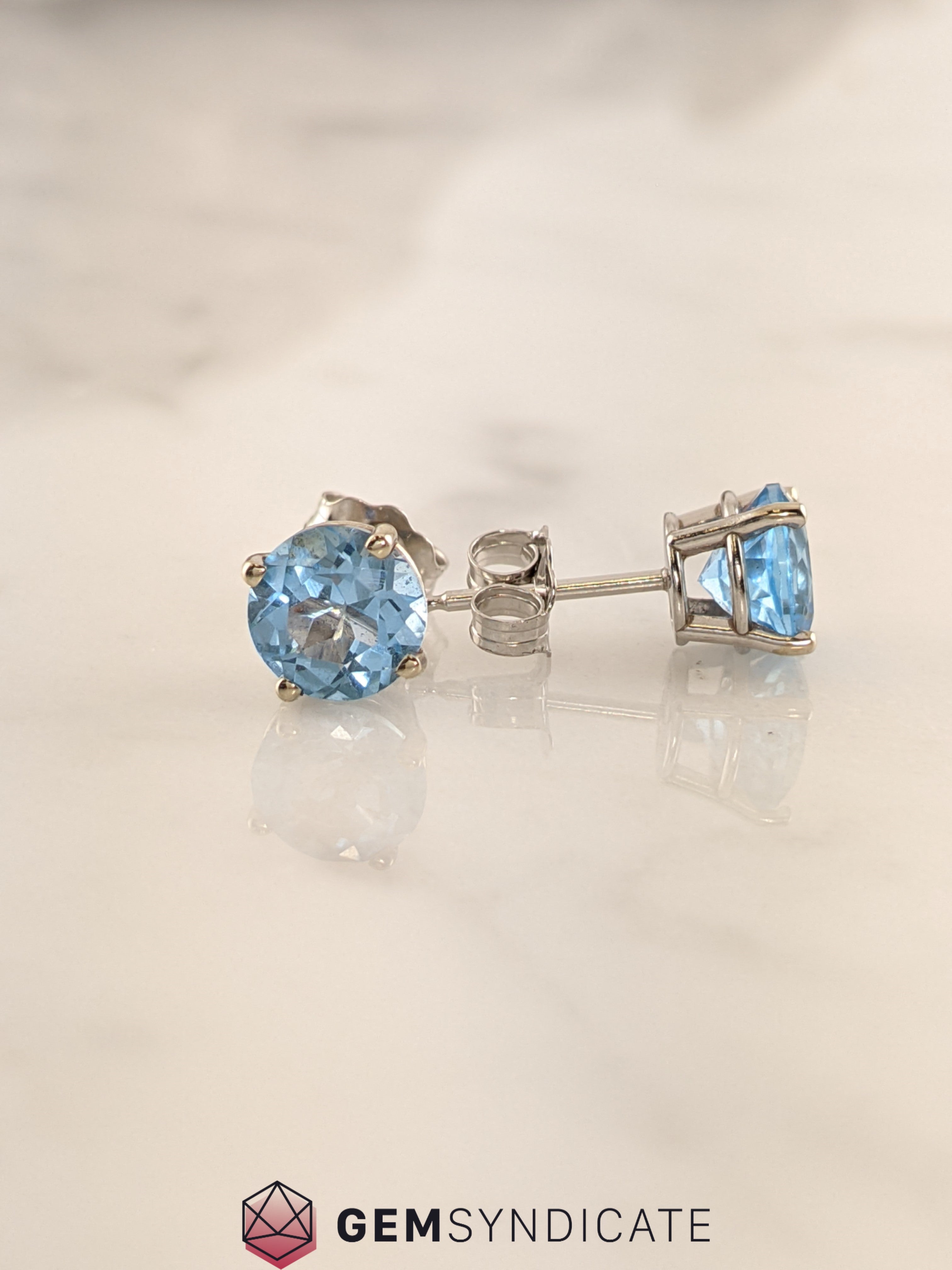 Dazzling Blue Topaz Solitaire Stud Birthstone Earrings