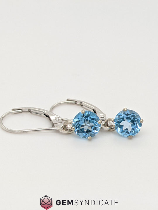 Whimsical Blue Topaz Solitaire Dangle Birthstone Earrings