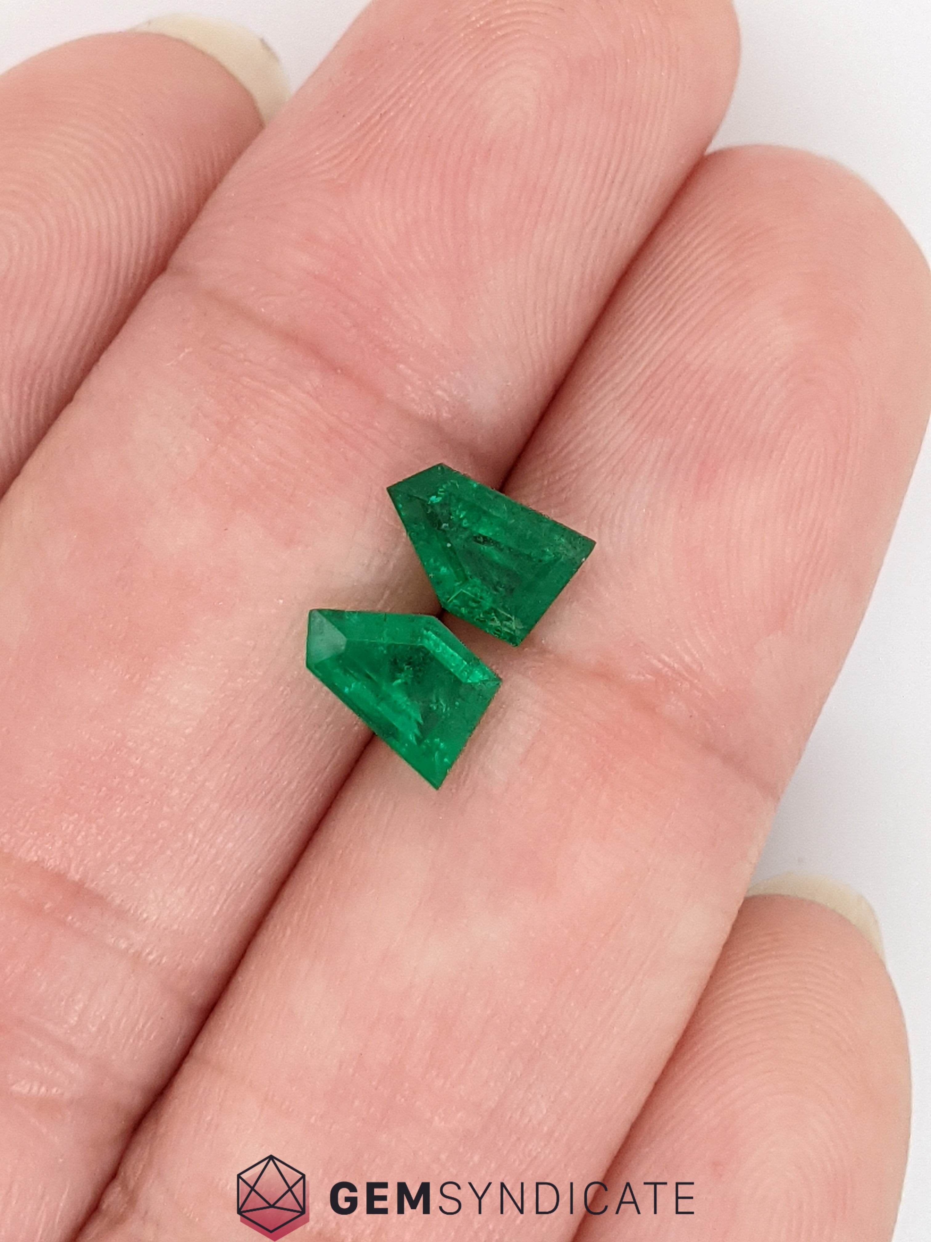 Delicate Fancy Shape Green Emerald Pair 1.31ctw