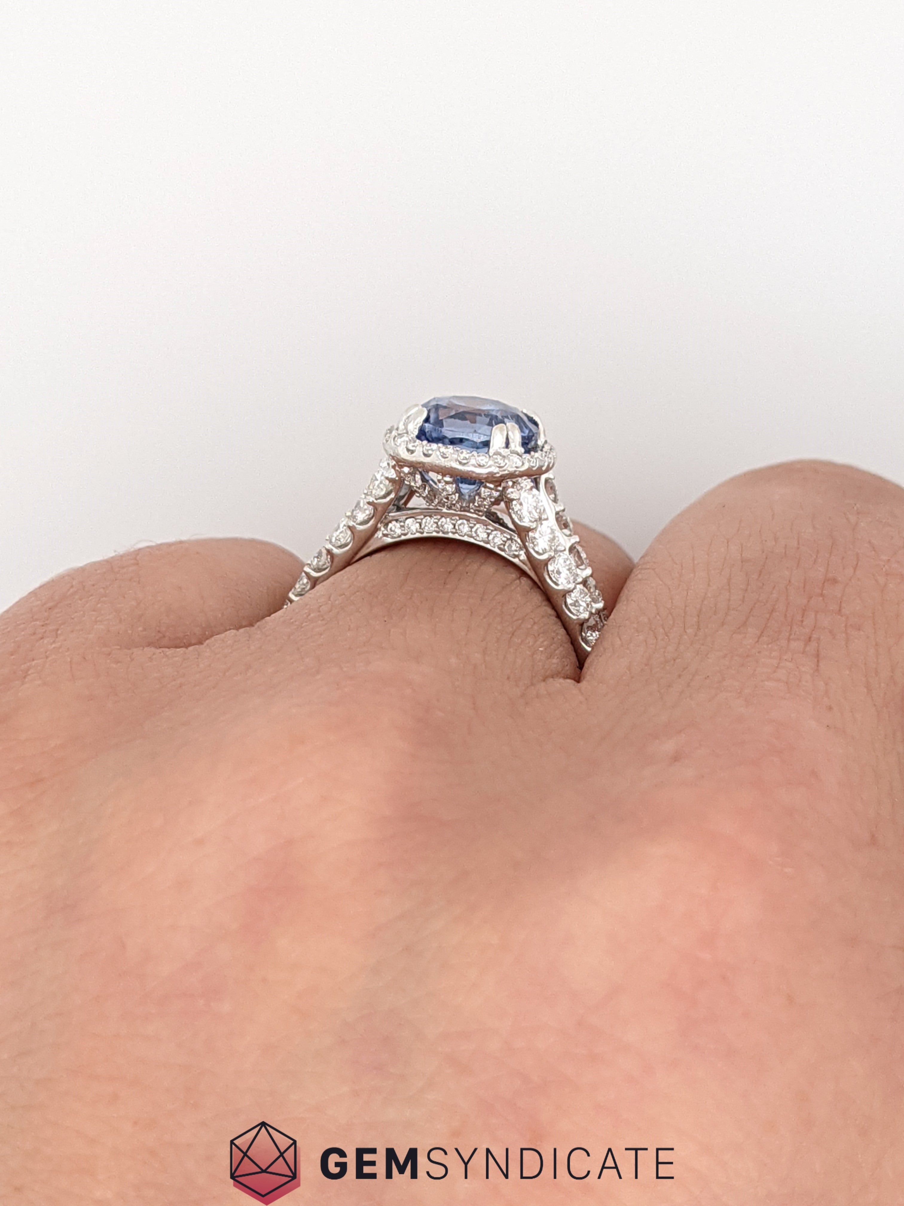 Show-Stopping Blue Sapphire Halo Ring in 14k White Gold