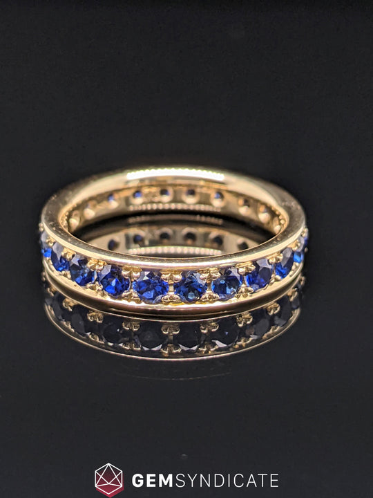 Beautiful Blue Sapphire Eternity Band in 14k Yellow Gold