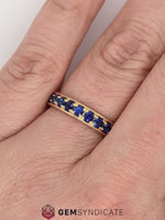 Load image into Gallery viewer, Beautiful Blue Sapphire Eternity Band in 14k Yellow Gold
