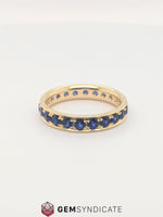 Load image into Gallery viewer, Beautiful Blue Sapphire Eternity Band in 14k Yellow Gold
