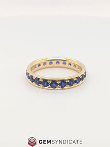 Beautiful Blue Sapphire Eternity Band in 14k Yellow Gold
