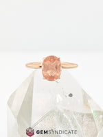 Load image into Gallery viewer, Gorgeous Oval Natural Oregon Sunstone Ring in 14k Rose Gold
