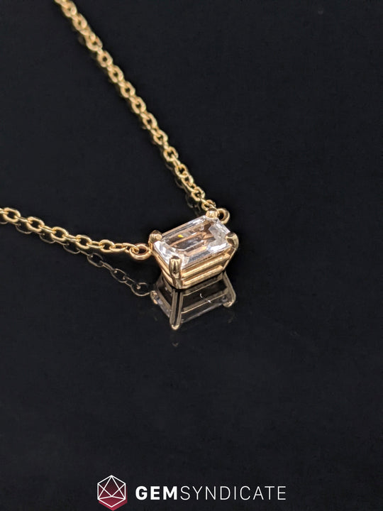 Flirty Emerald Cut White Sapphire Solitaire Necklace in 14k Yellow Gold