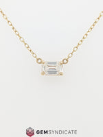 Load image into Gallery viewer, Flirty Emerald Cut White Sapphire Solitaire Necklace in 14k Yellow Gold

