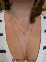 Load image into Gallery viewer, Magnificent Blue Topaz Solitaire Necklace in 14k White Gold
