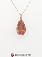 Load image into Gallery viewer, Remarkable Pear Shape Oregon Sunstone Pendant in 14k Rose Gold
