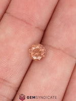 Load image into Gallery viewer, Mesmerizing Round Orange Sapphire 1.15ct
