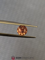 Load image into Gallery viewer, Electrifying Round Orange Sapphire 1.05ct
