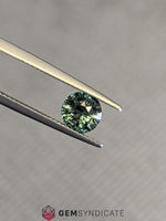 Load image into Gallery viewer, Superior Round Teal Sapphire 1.55ct
