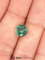Load image into Gallery viewer, Mesmerizing Round Teal Sapphire 2.75ct
