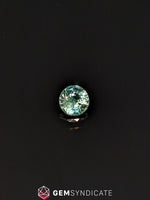 Load image into Gallery viewer, Flirty Round Teal Sapphire 0.67ct
