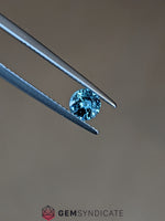 Load image into Gallery viewer, Flirty Round Teal Sapphire 0.67ct
