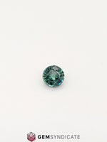 Load image into Gallery viewer, Flirty Round Teal Sapphire 0.67ct
