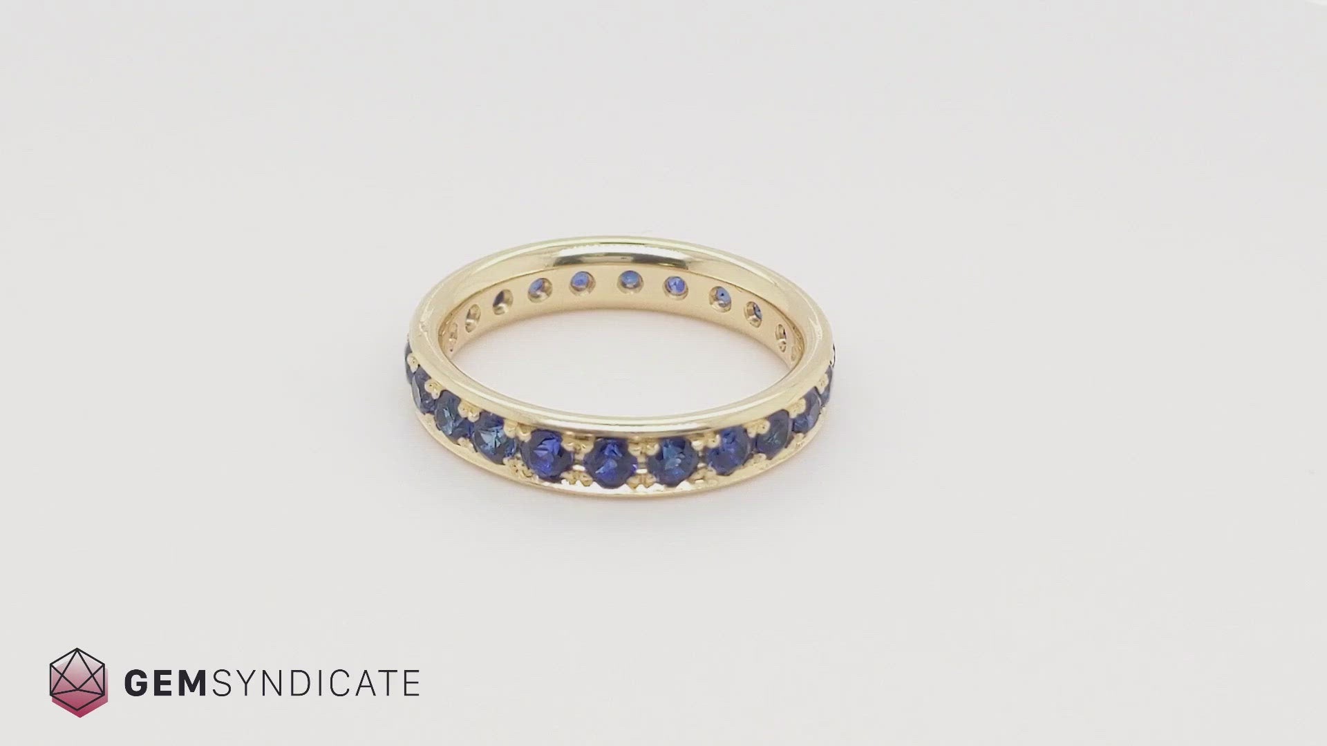 Beautiful Blue Sapphire Eternity Band in 14k Yellow Gold