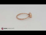 Load and play video in Gallery viewer, Graceful Peach Sapphire Solitaire Ring in 14k Rose Gold
