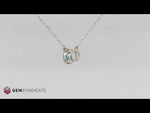 Load and play video in Gallery viewer, Electric Blue Zircon Solitaire Necklace in 14k White Gold
