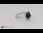 Load and play video in Gallery viewer, Stylish Bezel Set Cabochon Indicolite Tourmaline Solitaire Ring in 14k White Gold
