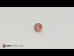 Load and play video in Gallery viewer, Mesmerizing Round Orange Sapphire 1.15ct
