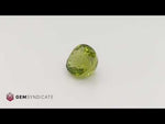 Load and play video in Gallery viewer, Glamorous Cushion Green Peridot 3.42ct
