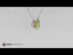 Load and play video in Gallery viewer, Lively Peridot Solitaire Necklace in 14k White Gold
